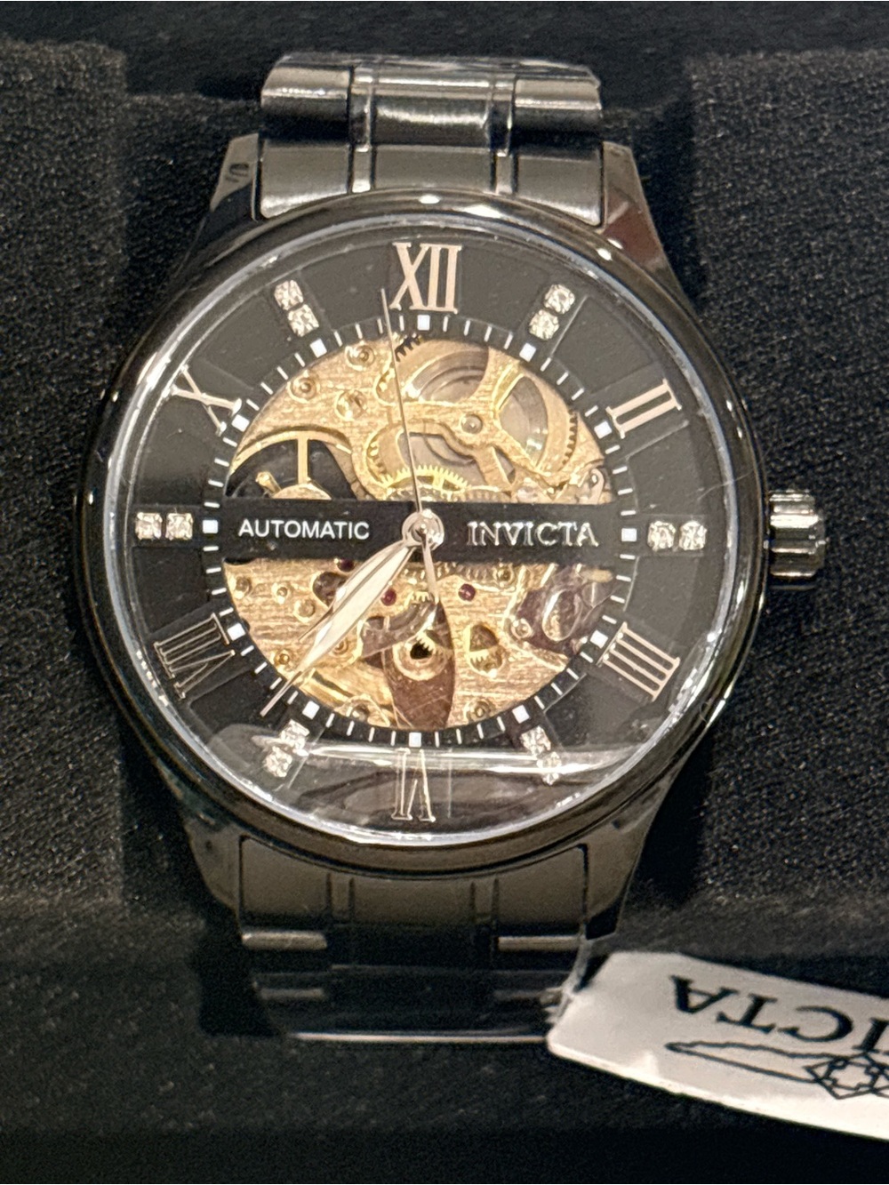 Invicta Men’s Black and Gold Skeleton Mechanical Watch